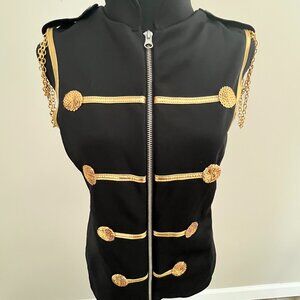 MJ would love this!  Gold and black zip up vest with long sleeve half shirt